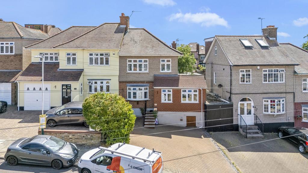 Street scene with property, garage