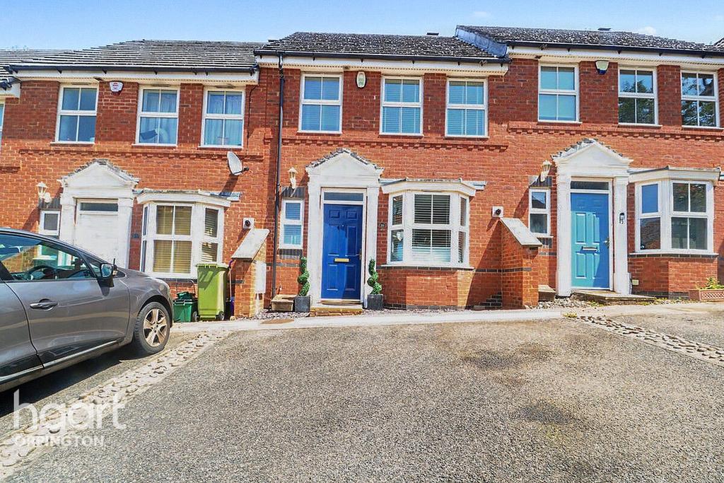 Terraced house exterior, parking