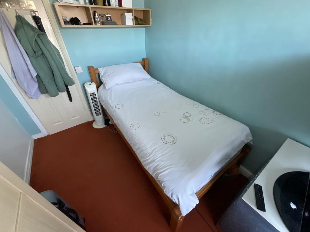 BEDROOM THREE 9' x 6'9