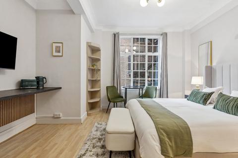 Studio to rent, Hallam Street, London W1W
