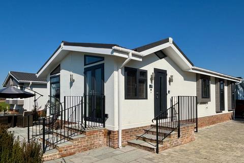 undefined, Almost New Luxury Park Home With Stunning Views Towards The River Wey