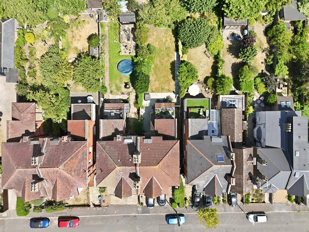 Street scene with property, garden