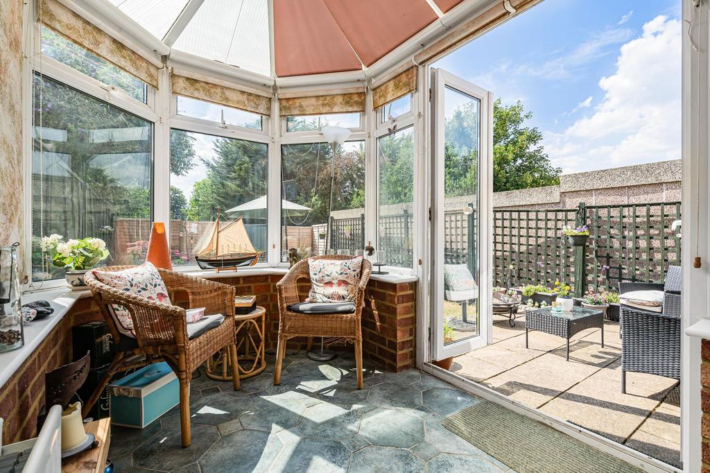 Conservatory interior, conservatory, french doors leading to garden