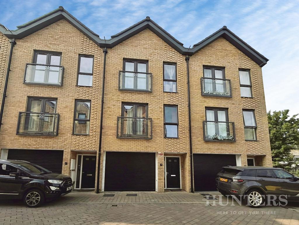 Terraced house exterior, parking