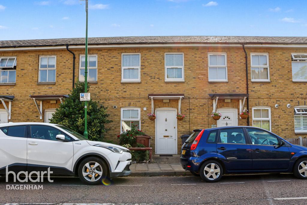Street scene with property, parking
