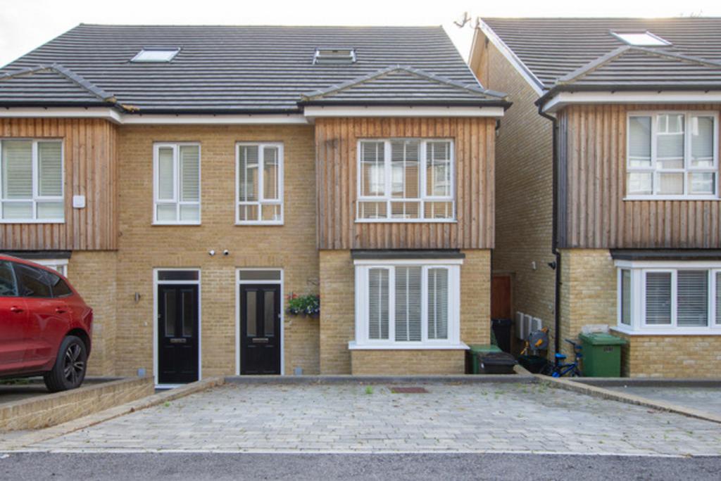 Terraced house exterior, parking