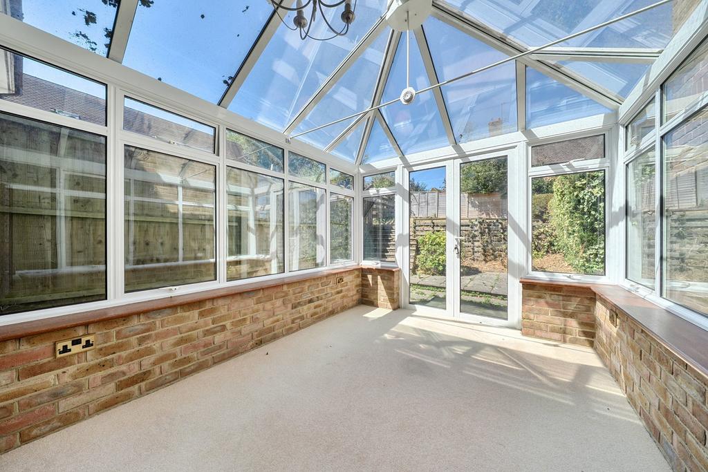 Conservatory interior, conservatory, french doors leading to garden