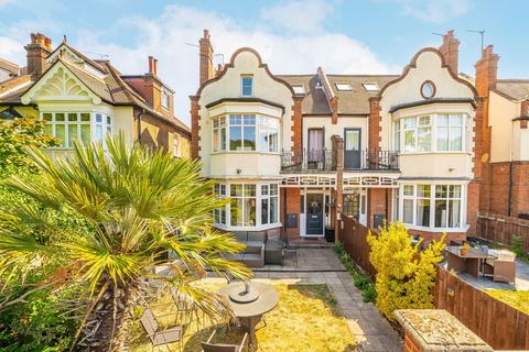Cottenham Park Road, London SW20