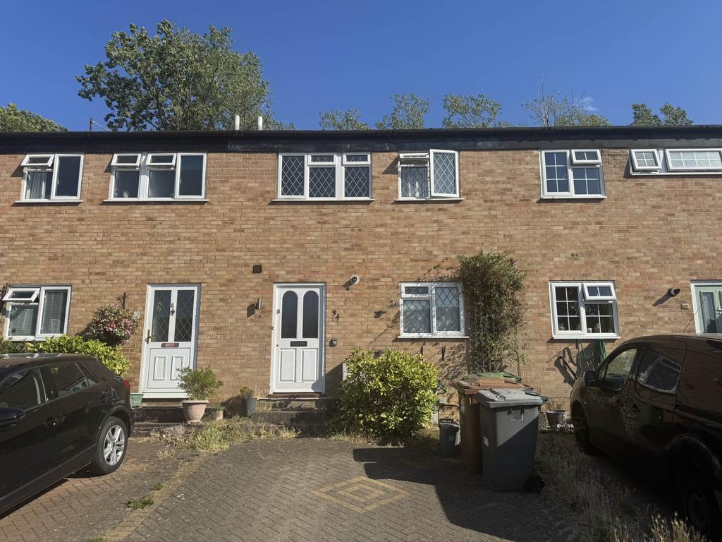 Terraced house exterior, parking