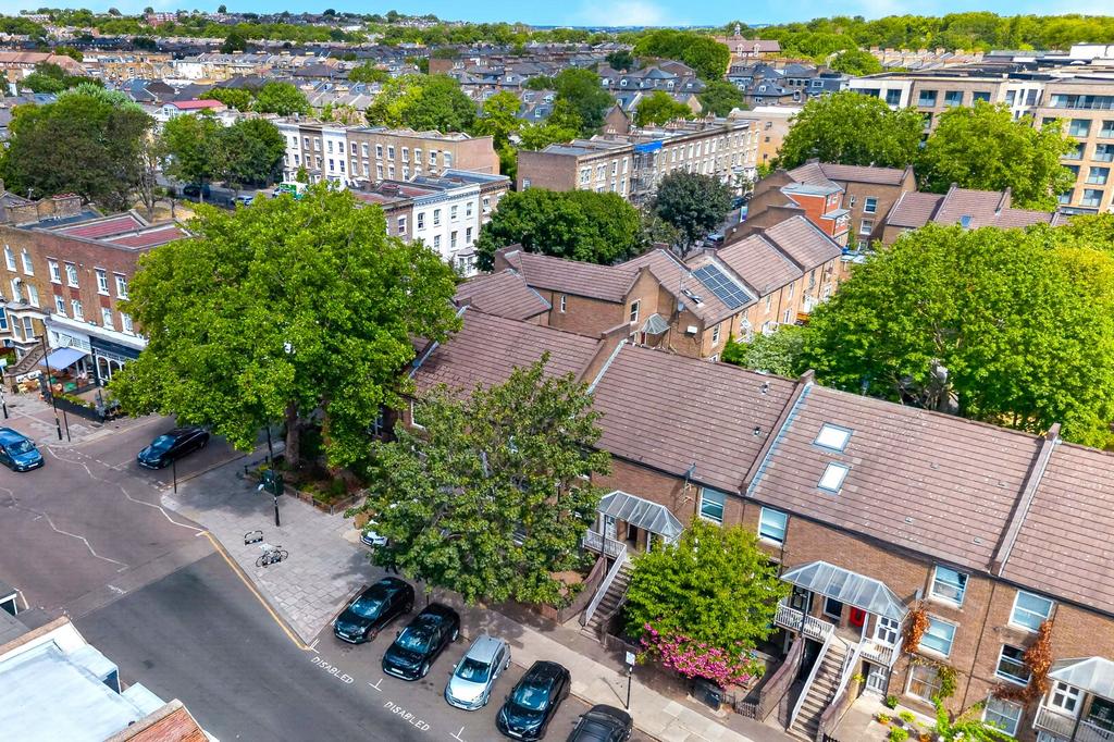 Street scene with property, parking