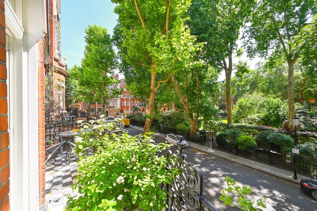 Street scene with property, garden
