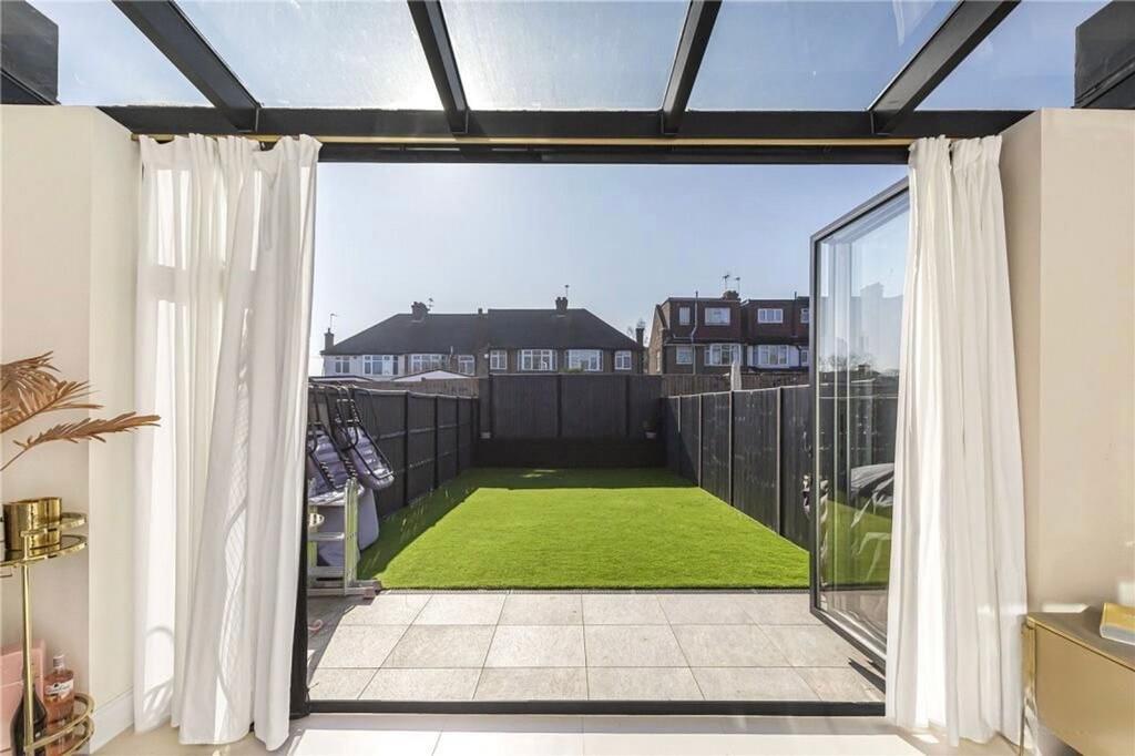 Conservatory interior, conservatory, french doors leading to garden