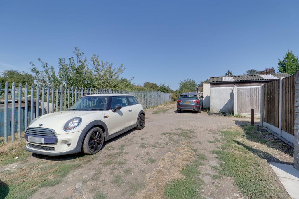 Driveway view, garage