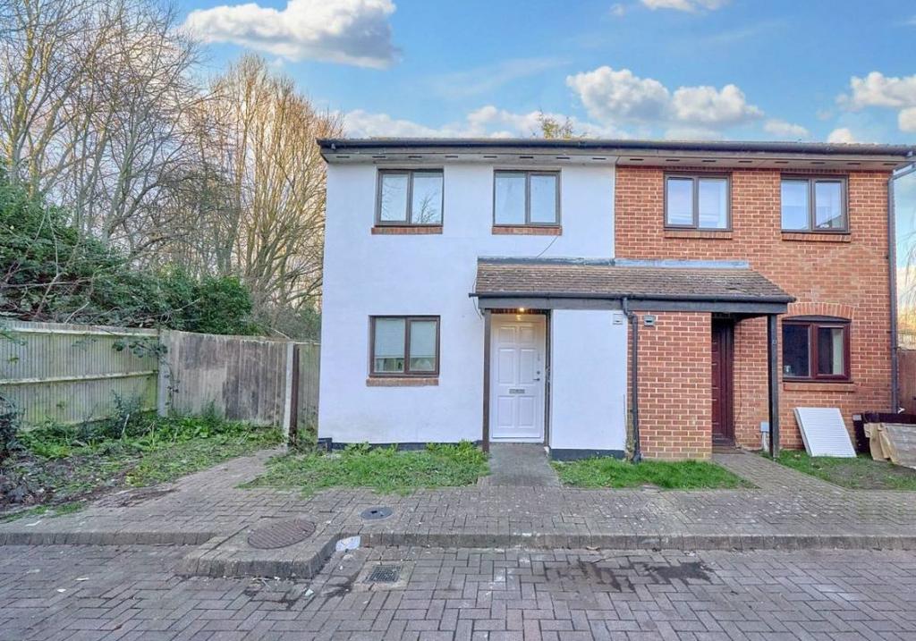 Semi-detached house exterior, driveway