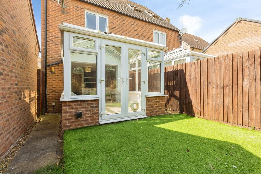 Conservatory interior, conservatory, french doors leading to garden