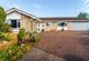 Beautifully refurbished detached bungalow set within approximately one third of an acre of glorious mature gardens