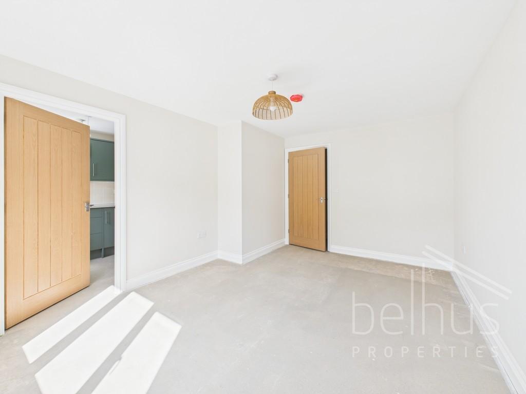 Sitting room through to kitchen