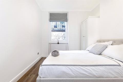 2 bedroom apartment to rent - Carburton Street, London, W1W