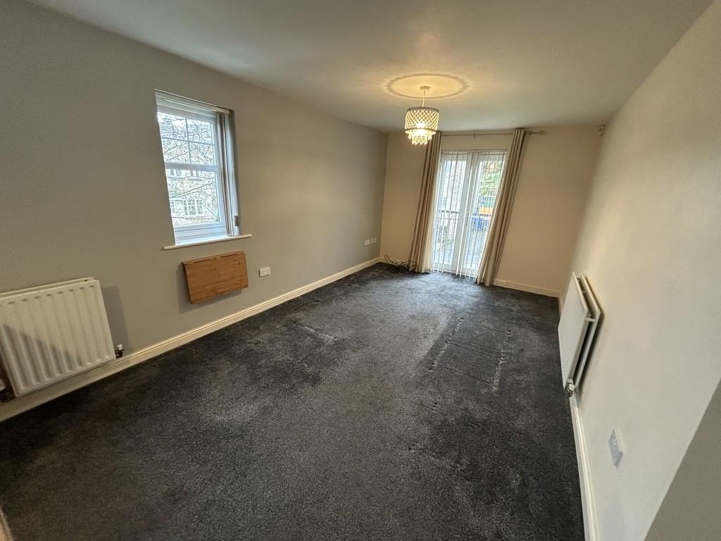 Open plan living area and kitchen area