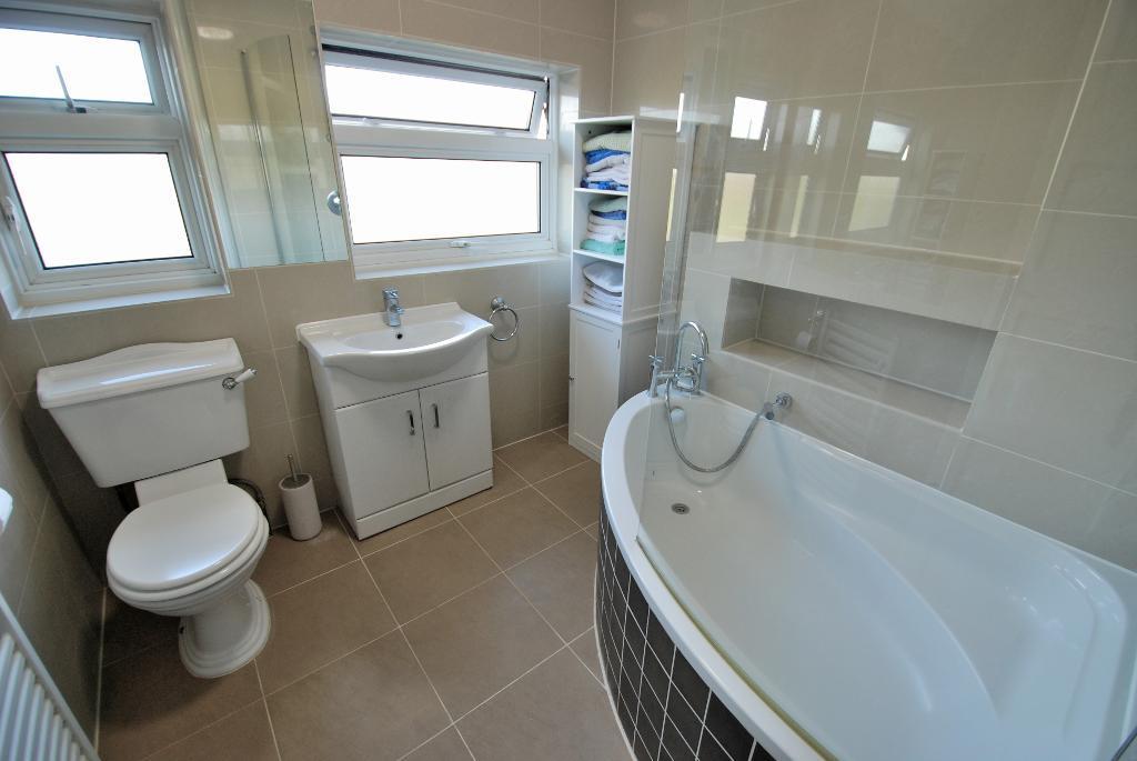Fully Tiled Family Bathroom