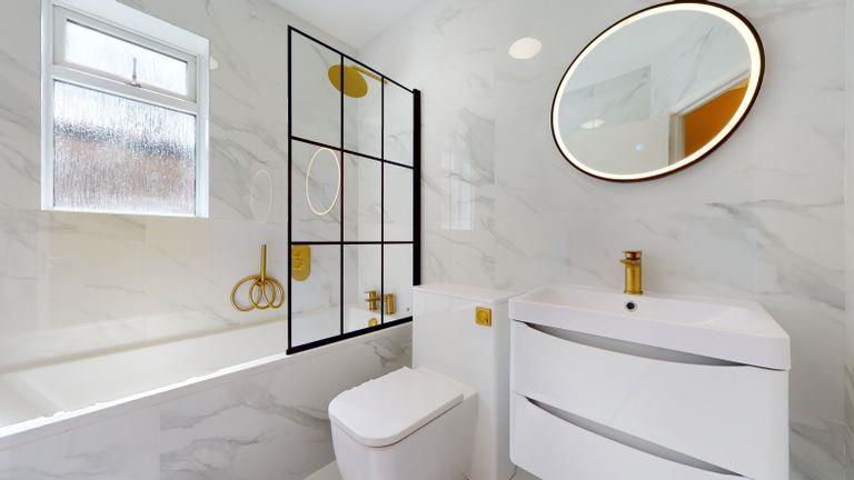 Tiled bathroom combined W.C