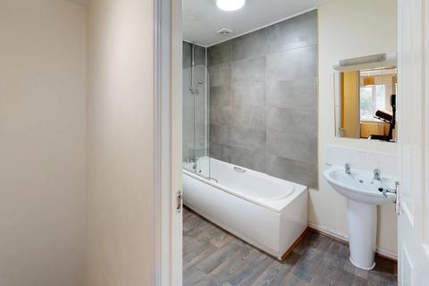 14 Aspull Walk, Manchester, M13 9ER