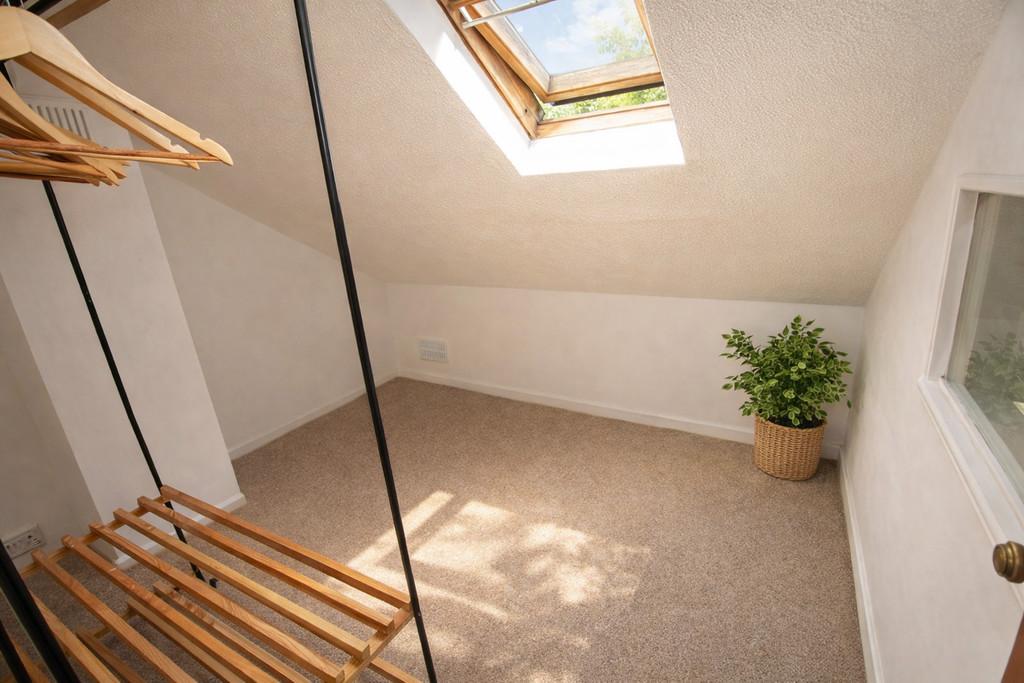 Attic space with natural light and greenery