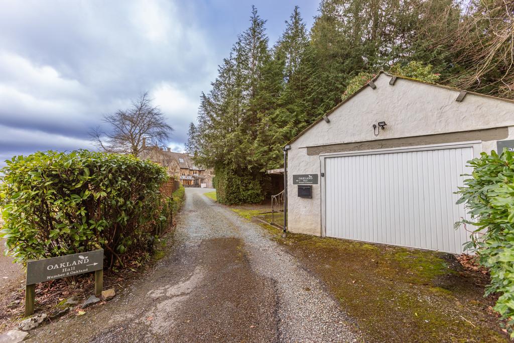 Garage at the entrance to driveway