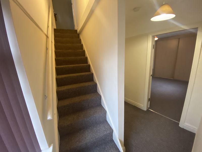 Stairs to top floor