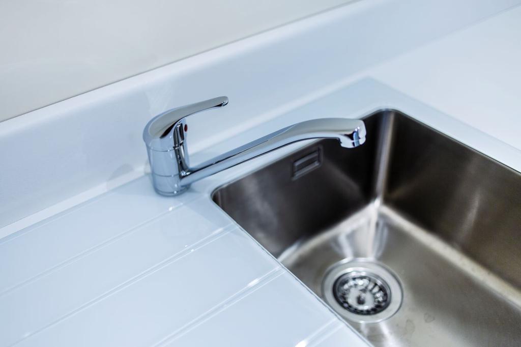 Cabinets and fitted work surface with sink