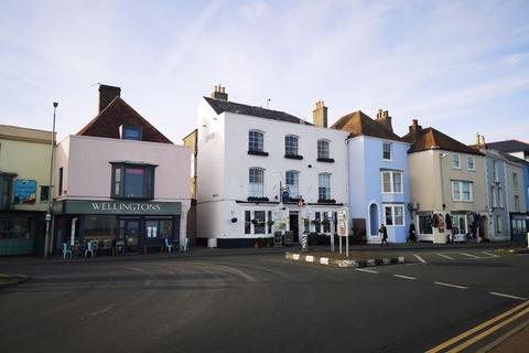 Hotel for sale - LEASEHOLD FULLY LICENSED HOTEL BUSINESS FOR SALE IN A PRIME LOCATION ON DEAL SEAFRONT