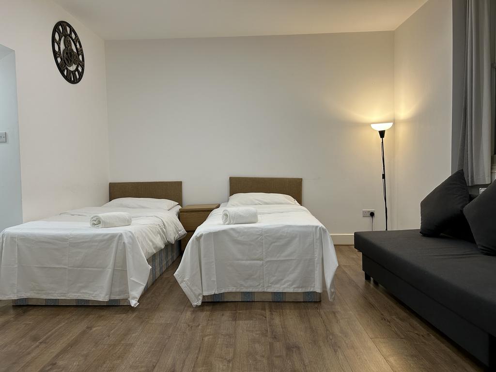 2 Single beds and Ikea Sofa-bed