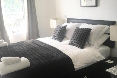 undefined, Woking,  Surrey,  GU21