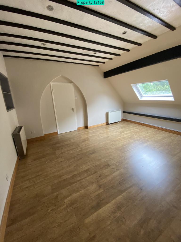 Top floor flat with vaulted ceiling
