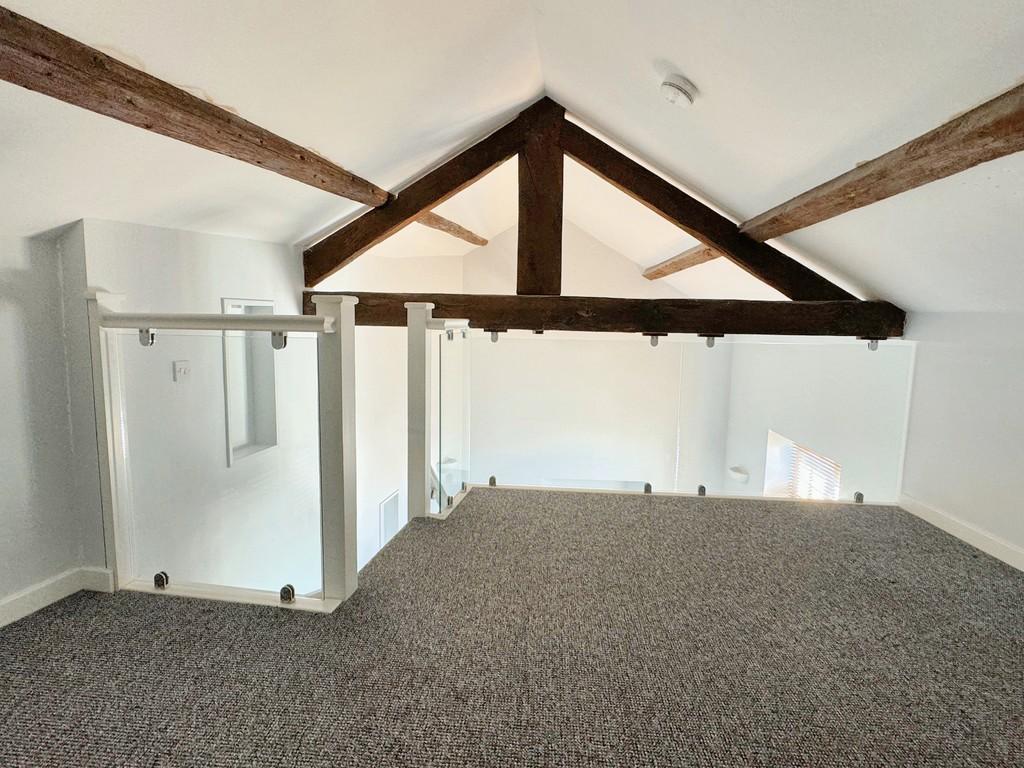 Mezzanine Showing Exposed Beams