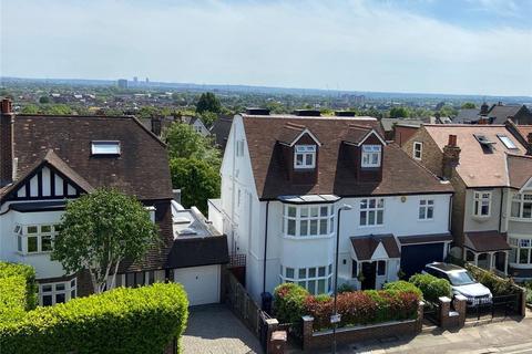 18 Dora Road, London, SW19 7HH
