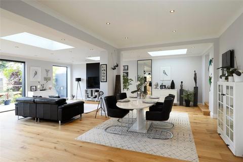 18 Dora Road, London, SW19 7HH