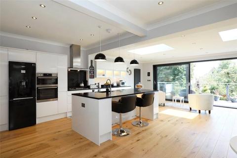 18 Dora Road, London, SW19 7HH