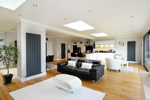 18 Dora Road, London, SW19 7HH