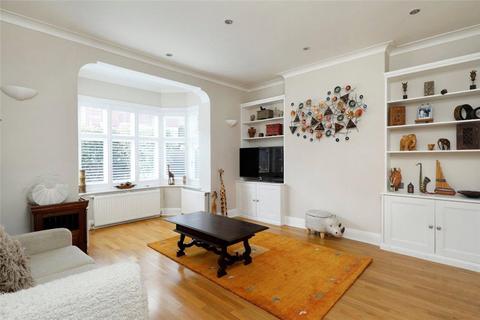 18 Dora Road, London, SW19 7HH