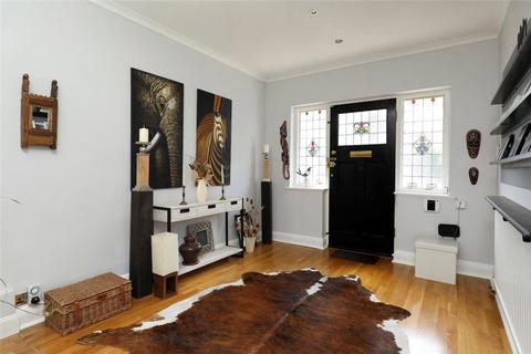 18 Dora Road, London, SW19 7HH