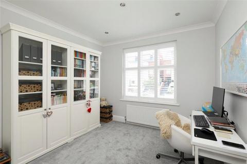 18 Dora Road, London, SW19 7HH