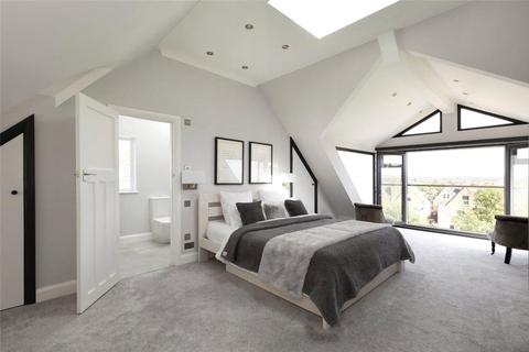 18 Dora Road, London, SW19 7HH