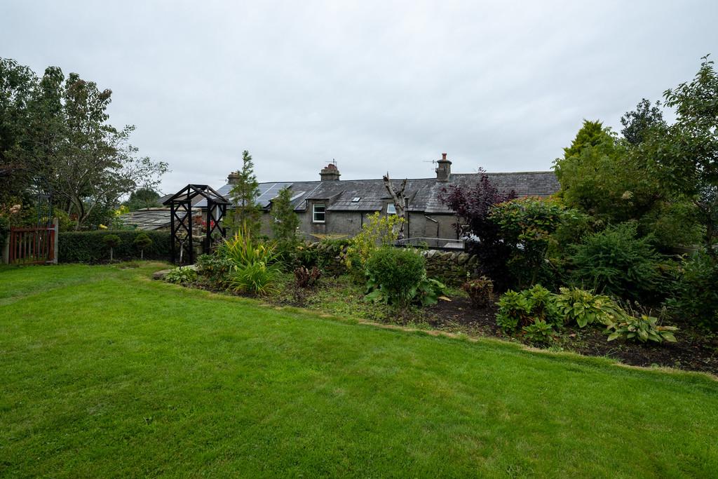 Planted Borders and Manicured Lawns