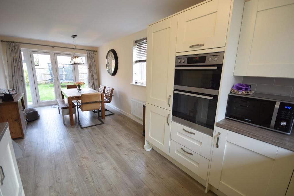 Kitchen through dining room