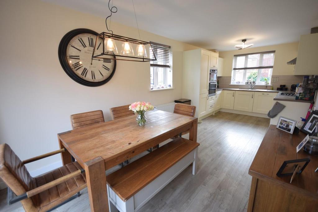 Kitchen through dining room