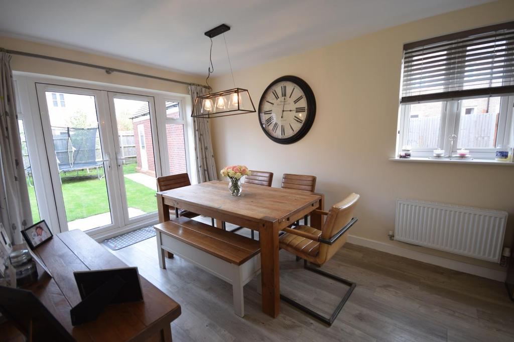 Kitchen through dining room