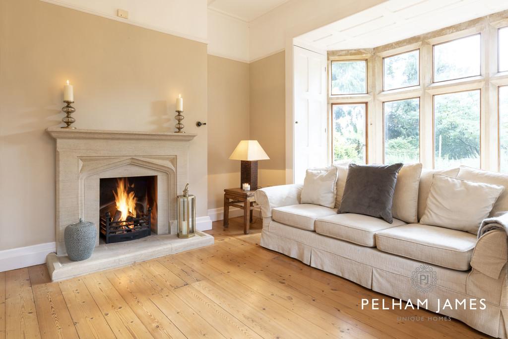 Sitting room with Clipsham stone fireplace