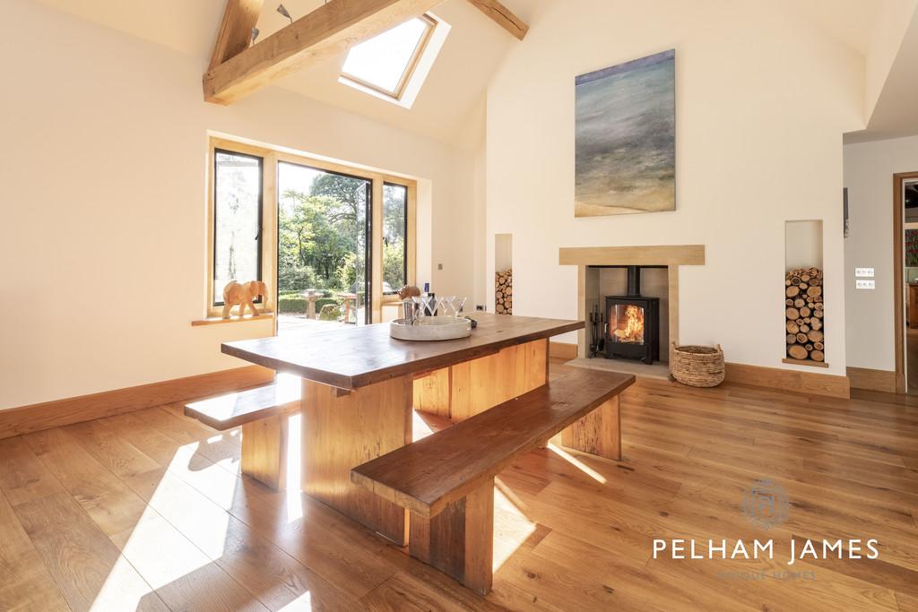 Family dining area with woodburner