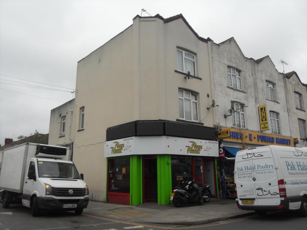 Freehold Title for sale - Pizza Shop with flats a